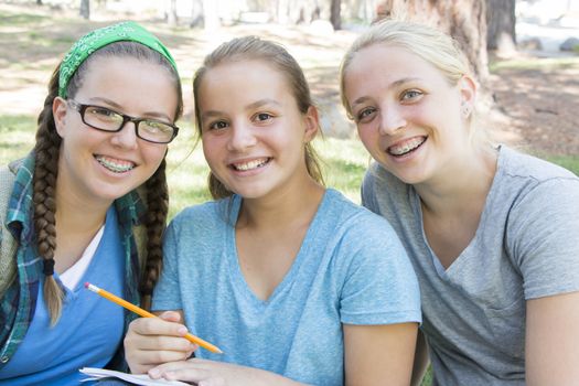 Young Girls Studying at the Park