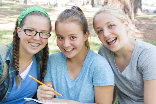 Young Girls Studying at the Park