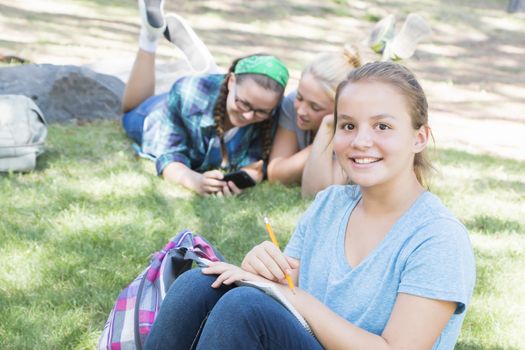 Young Girls Studying at the Park