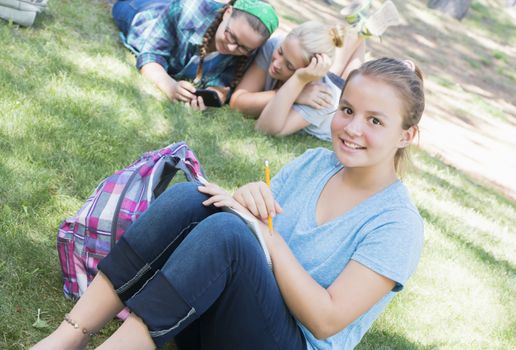 Young Girls Studying at the Park