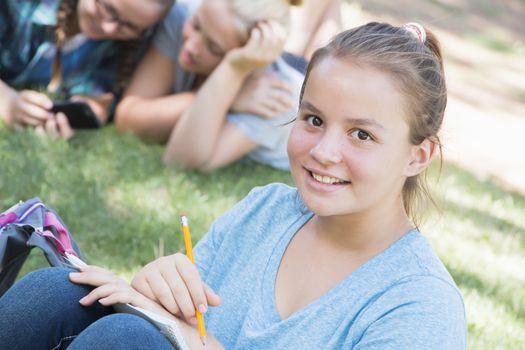 Young Girls Studying at the Park