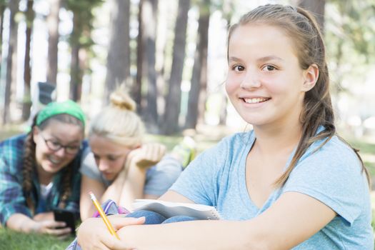 Young Girls Studying at the Park