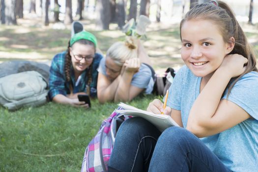 Young Girls Studying at the Park