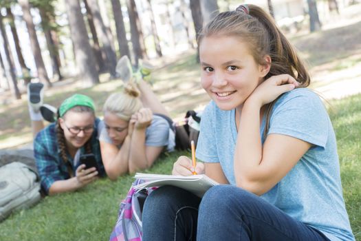 Young Girls Studying at the Park