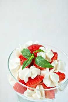 strawberry with cream closeup photo