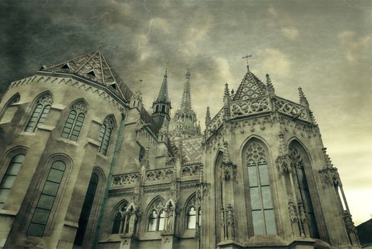 Budapest, Hungary. Matthias or Parish Church of Our Lady Mary was built in 13th century, now in Neo-Gothic architecture style landmark of hungarian country. Photo in old color image style.