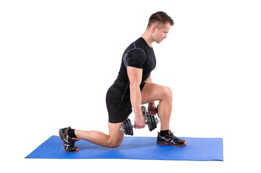 Young man shows finishing position of Dumbbell Split-Squat workout, isolated on white