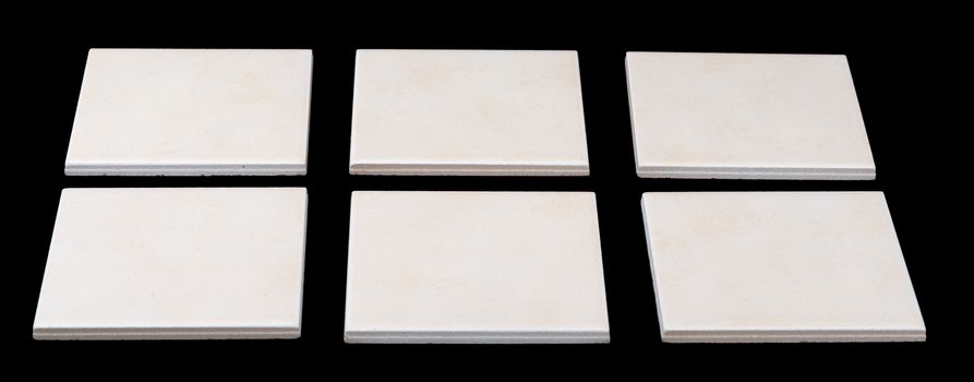 Set of tiles on black backround, side view