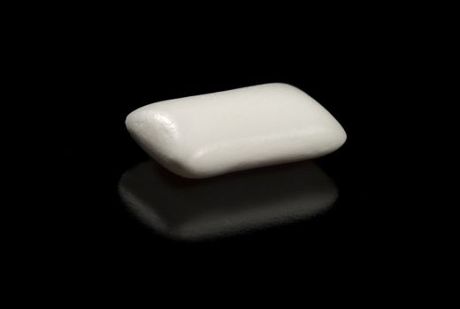Chewing Gum Close Up on black background.