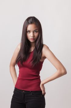 closeup fashion portrait of asian young sexy woman posing in studio .
