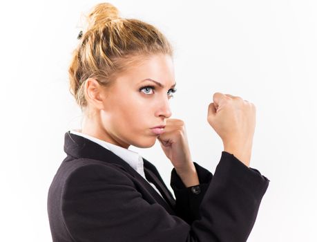 Angry Businesswoman boxing punching ready to fight.