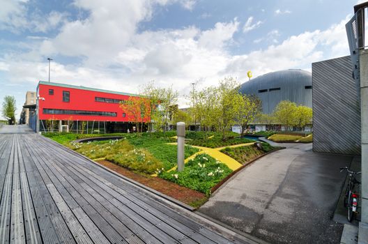 Almere, Netherlands - May 5, 2015: Modern city center of Almere, Flevoland, the newest city in the Netherlands, where construction began in 1975.