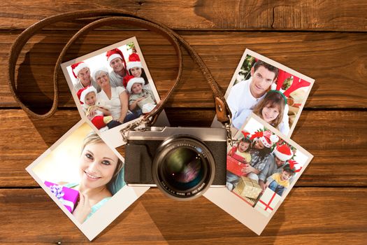 Children sitting with their family holding Christmas boots against chemical structure in grey and white