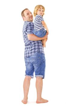 Portrait of young attractive smiling father playing with his little cute son on white background.