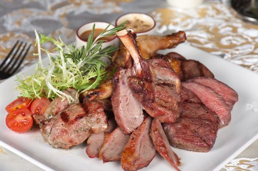 grilled meat with herbs and vegetables
