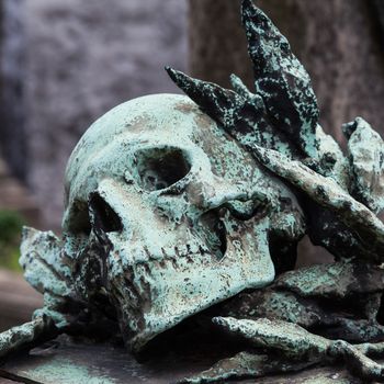 More than 100 years old statue. Cemetery located in North Italy.