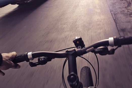 Photograph of an urban cyclist real view of the street