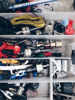 Close up of Nuts, bolts and screws in box background