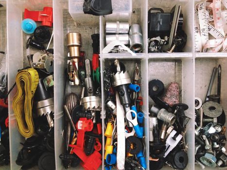 Close up of Nuts, bolts and screws in box background