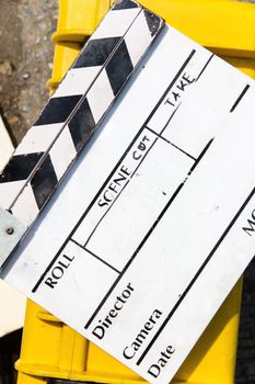 close up image of Film Slate on set
