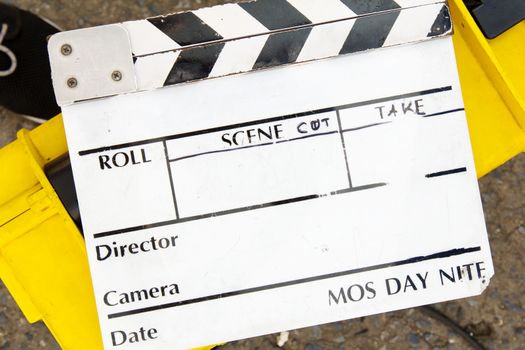 close up image of Film Slate on set
