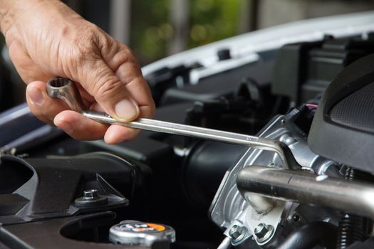 Professional car mechanic, auto repair concept