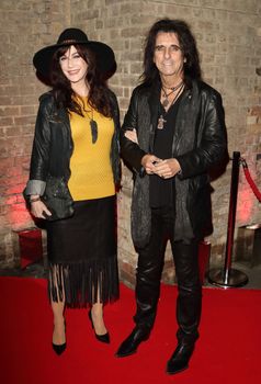 UK, London:  Alice Cooper (pictured with Sheryl Cooper) won the Classic Album award at the Classic Rock Roll of Honour awards at the Roundhouse, in London on November 11, 2015. Queen took out the award for Living Legends.