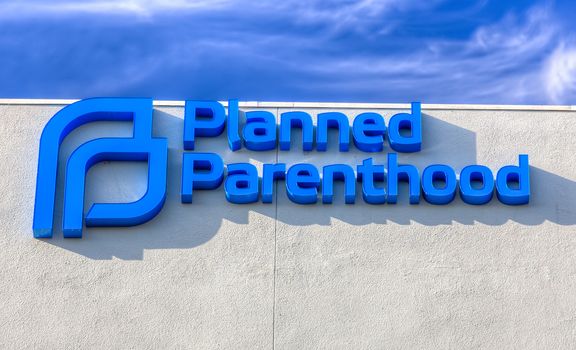LOS ANGELES, CA/USA - NOVEMBER 8, 2015: Planned Parenthood clinic exterior and logo. Planned Parenthood is a non-profit organization that provides reproductive health services.