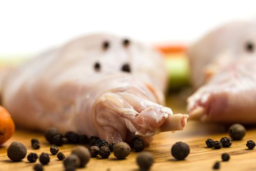 Raw rabbit with black pepper and allspice