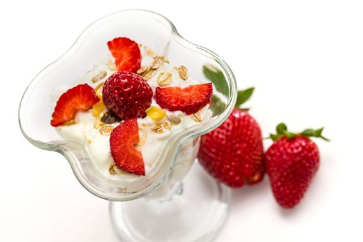 Glass of Muesli with strawberries and yogurt