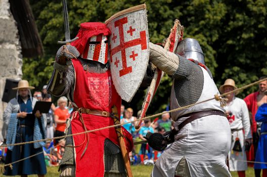 CHORZOW,POLAND, JUNE 9: Fight of medieval knights during a IV Convention of Christian Knighthood on June 9, 2013, in Chorzow