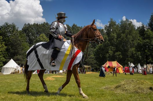 CHORZOW,POLAND, JUNE 9: Medieval knight on horseback during a IV Convention of Christian Knighthood on June 9, 2013, in Chorzow