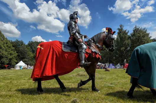 CHORZOW,POLAND, JUNE 9: Medieval knight on horseback during a IV Convention of Christian Knighthood on June 9, 2013, in Chorzow