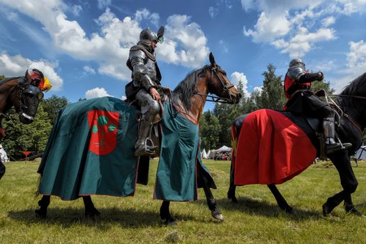 CHORZOW,POLAND, JUNE 9: Medieval knight on horseback during a IV Convention of Christian Knighthood on June 9, 2013, in Chorzow