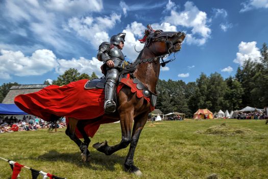 CHORZOW,POLAND, JUNE 9: Medieval knight on horseback during a IV Convention of Christian Knighthood on June 9, 2013, in Chorzow