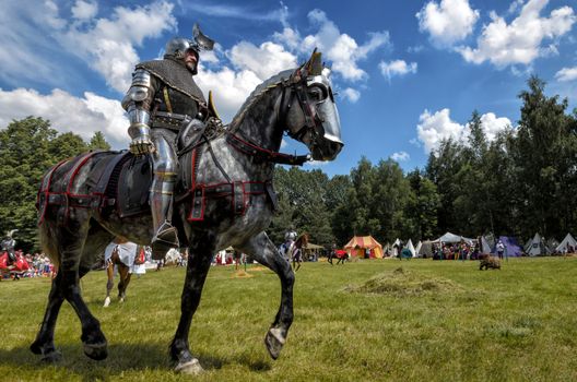 CHORZOW,POLAND, JUNE 9: Medieval knight on horseback during a IV Convention of Christian Knighthood on June 9, 2013, in Chorzow