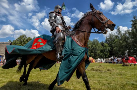 CHORZOW,POLAND, JUNE 9: Medieval knight on horseback during a IV Convention of Christian Knighthood on June 9, 2013, in Chorzow