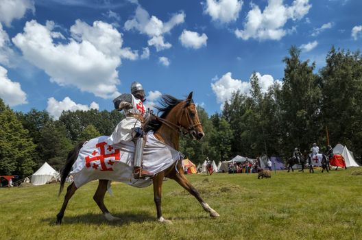 CHORZOW,POLAND, JUNE 9: Medieval knight on horseback during a IV Convention of Christian Knighthood on June 9, 2013, in Chorzow