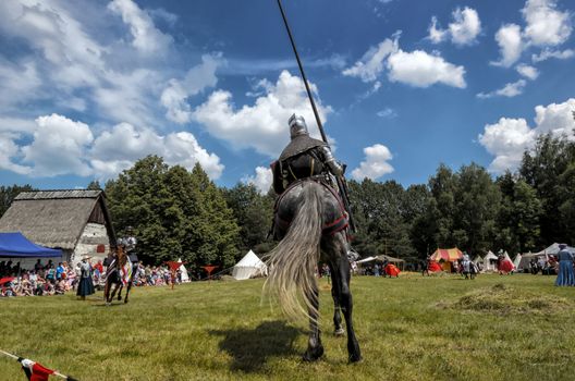 CHORZOW,POLAND, JUNE 9: Medieval knight on horseback during a IV Convention of Christian Knighthood on June 9, 2013, in Chorzow