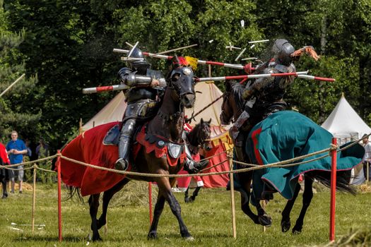 CHORZOW,POLAND, JUNE 9: Medieval knights jousting during a IV Convention of Christian Knighthood on June 9, 2013, in Chorzow