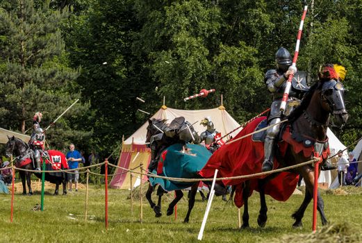 CHORZOW,POLAND, JUNE 9: Medieval knights jousting during a IV Convention of Christian Knighthood on June 9, 2013, in Chorzow