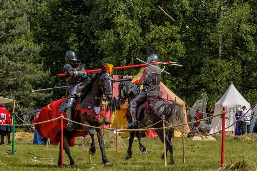 CHORZOW,POLAND, JUNE 9: Medieval knights jousting during a IV Convention of Christian Knighthood on June 9, 2013, in Chorzow