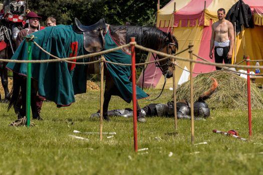 CHORZOW,POLAND, JUNE 9: Medieval knight defeated in jousting during a IV Convention of Christian Knighthood on June 9, 2013, in Chorzow