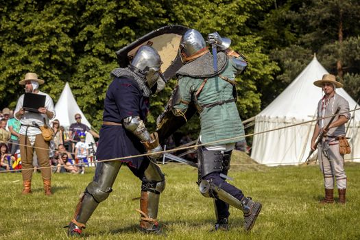 CHORZOW,POLAND, JUNE 9: Fight of medieval knights during a IV Convention of Christian Knighthood on June 9, 2013, in Chorzow