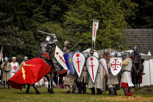 CHORZOW,POLAND, JUNE 9: Battle of medieval knights during a IV Convention of Christian Knighthood on June 9, 2013, in Chorzow