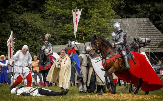 CHORZOW,POLAND, JUNE 9: Battle of medieval knights during a IV Convention of Christian Knighthood on June 9, 2013, in Chorzow