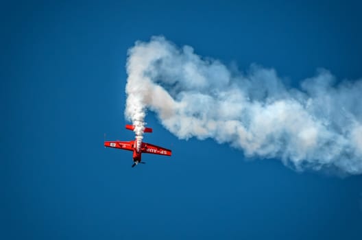 RADOM, POLAND - AUGUST 25: Aerobatic group formation "Zelazny" at blue sky during Air Show 2013 event on August 25, 2013 in Radom, Poland