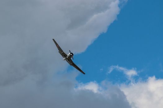 RADOM, POLAND - AUGUST 25: TS-8 "Bies" historical aircraft flying during Air Show 2013 event on August 25, 2013 in Radom, Poland