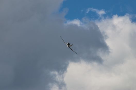 RADOM, POLAND - AUGUST 25: TS-8 "Bies" historical aircraft flying during Air Show 2013 event on August 25, 2013 in Radom, Poland