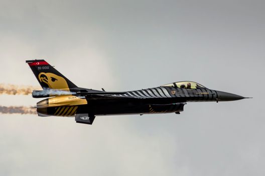 RADOM, POLAND - AUGUST 25: Turkish F-16 Falcon - Soloturk Display Team during Air Show 2013 event on August 25, 2013 in Radom, Poland